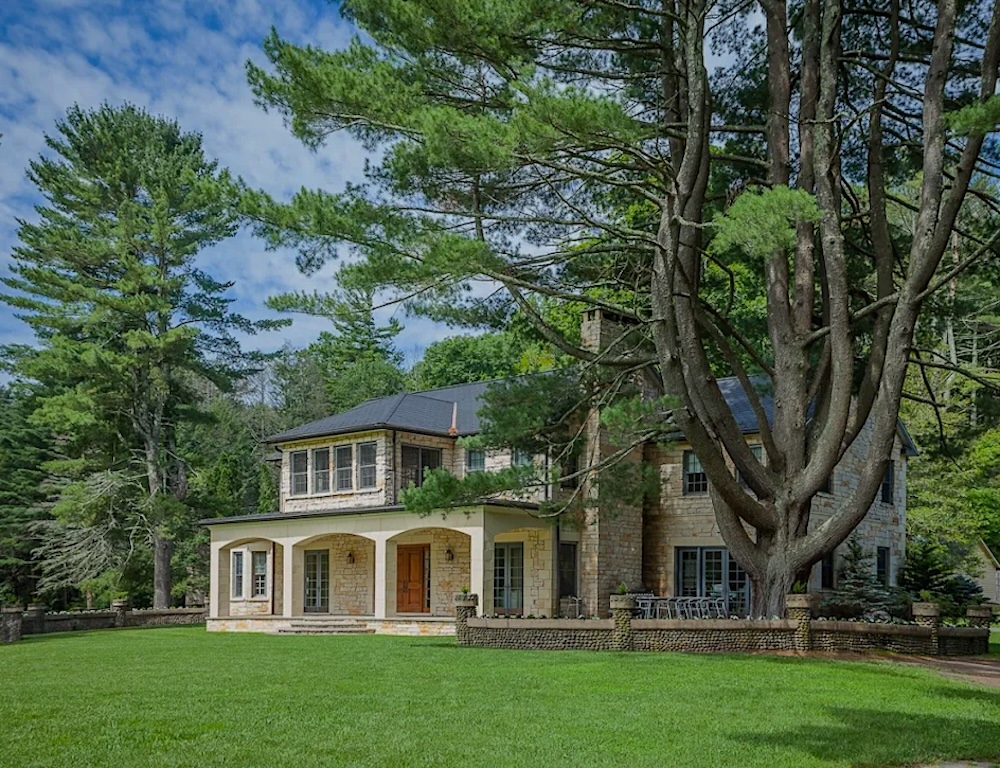 wolf tree next to a building on the Spacious, Refined Interiors Property in Warsing, Ulster County NY