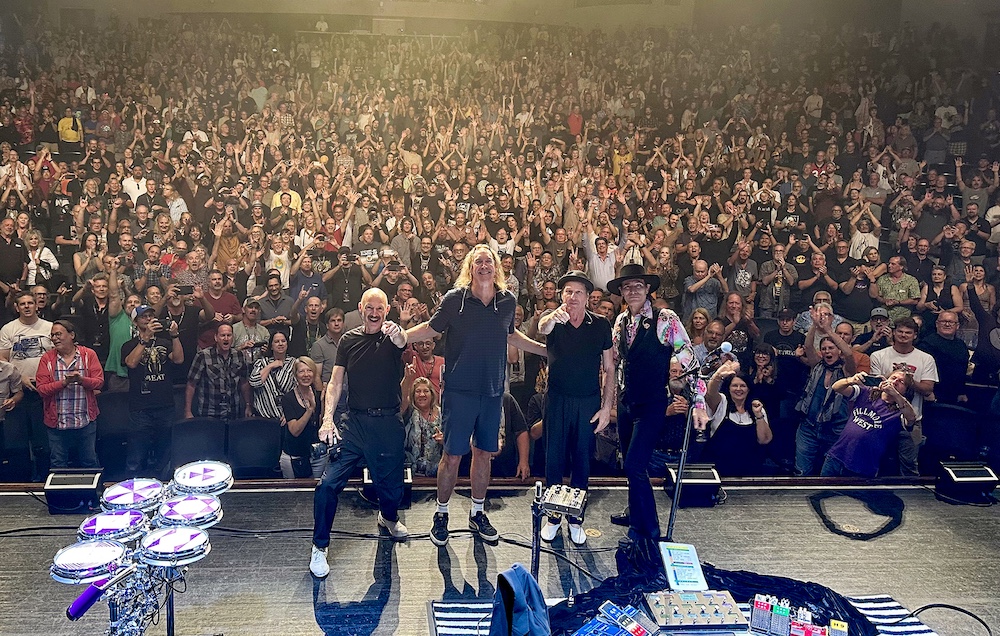 BEAT musicians posing for a photo with the crowd at a show in Clearwater FL