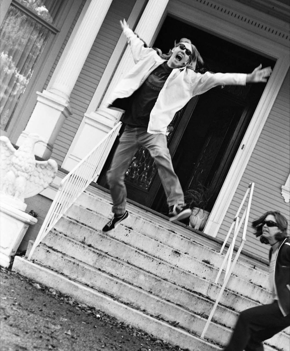Eric Erlandson, and Patty Schemel on front steps of haunted house, New Orleans, 1996. © Melissa Auf der Maur