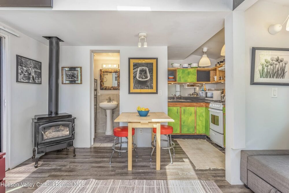 fireplace and dining room at 166 Todd Hill Road, West Kill NY