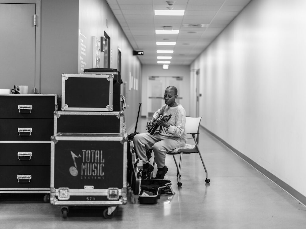 Gail Ann Dorsey practicing backstage at Eau Claire Festival
