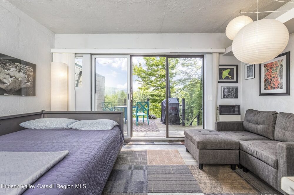 lengthwise of bedroom with view at 166 Todd Hill Road, West Kill NY