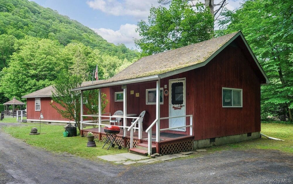 red cabin at 5973 State Route 28, Phoenicia NY with Halter Associates Realty