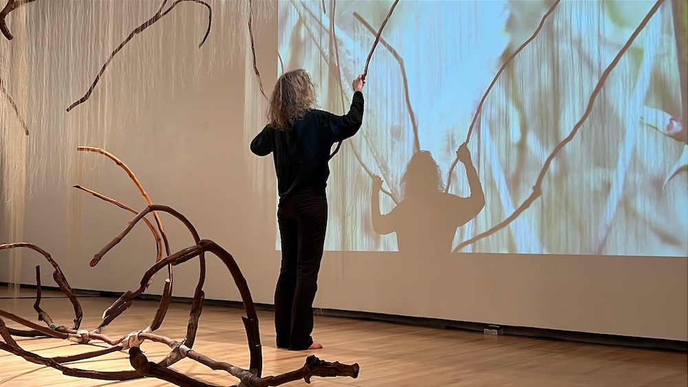 Artist Millicent Young in her Sutra for Belonging Performance piece at the Hyde Collection