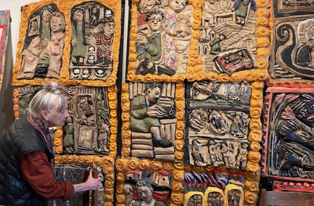 Amy Trompetter showing her paper mache wall at Redwing Blackbird Theater in Rosendale NY