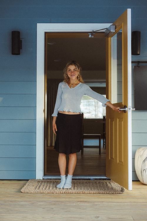 Rachel Levine Intuitively Wild in doorway welcoming in clients