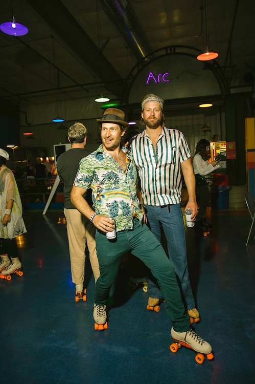Two guys posing at Catskills Roller Disco