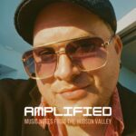 Manuel Quintana with "Amplified" written across the feature cover.