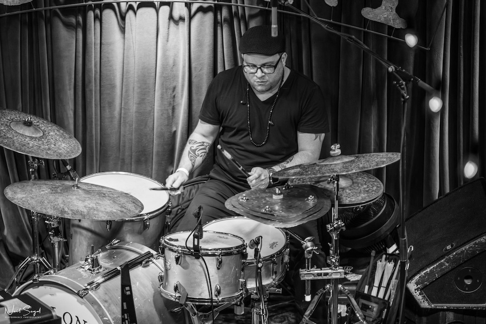 Manuel Quintana drumming. Photo by Neil Segal.