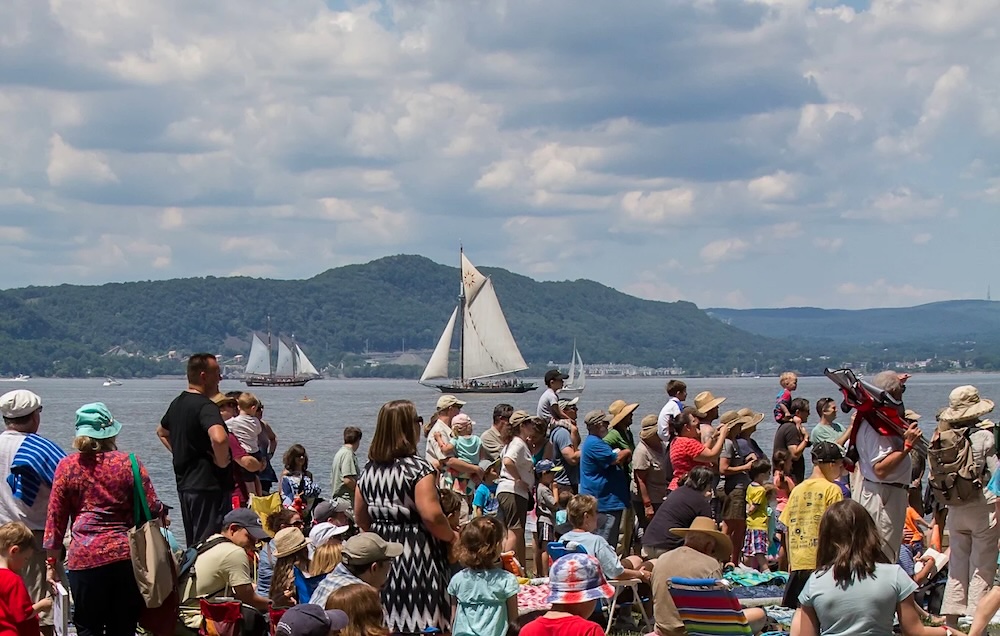 Hudson River Music Festival with views of the Hudson and sailboats in the background