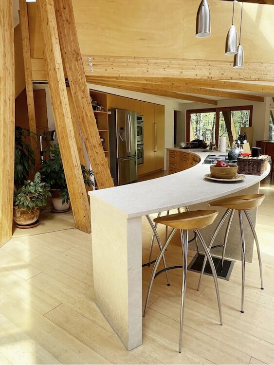 A curved kitchen table.