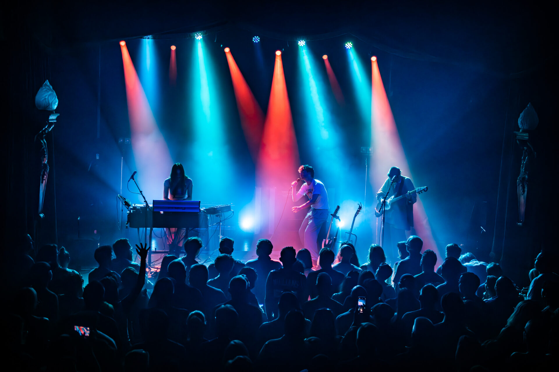 colorful lights in stage with Nation of Language at Bearsville Theater