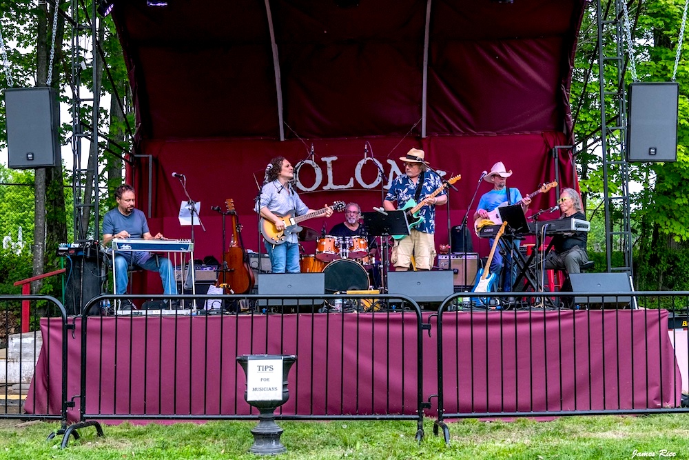 A band playing on the Golony Woodstock stage in the Garden.