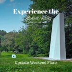 Large white sculpture in the grass with trees and a white cube in the distance at Storm King Art Center in Windsor NY with the "Experience the Hudson Valley" and "Upstate Weekend Plans" text written across the photo.