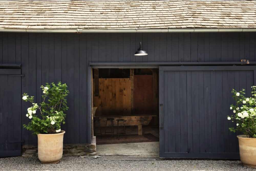 The black barn doors with one open at 809 North Quaker Hill Road, Pawling NY.