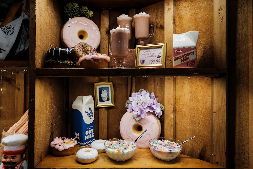 Candlestock shop in Woostock, NY shelf with donut candles