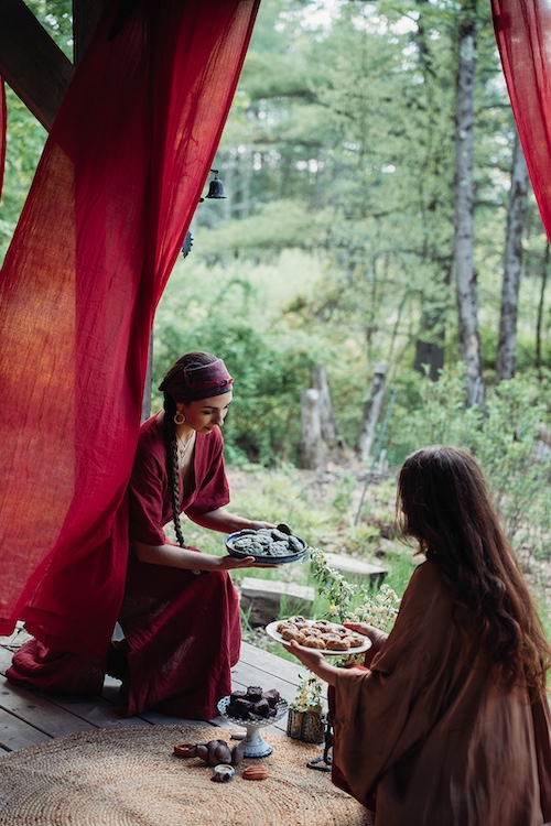 Sasha Botanica and Diana Wassef gathering treats for the Red Tent Event.