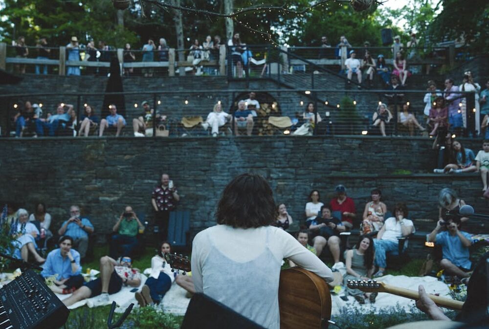 Ginger Winn singing on stage at the 2026 Waterfall Sessions III