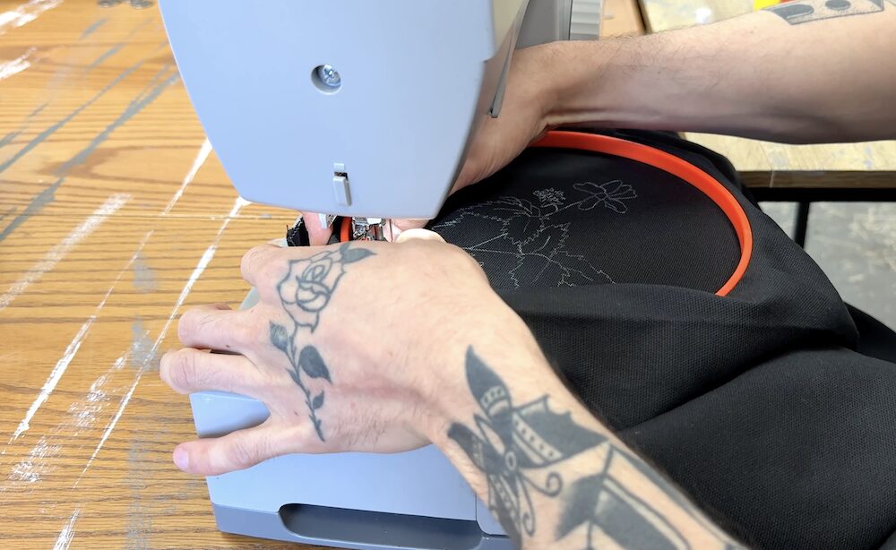 At the sewing machine: textile artist Matthew Gilbert