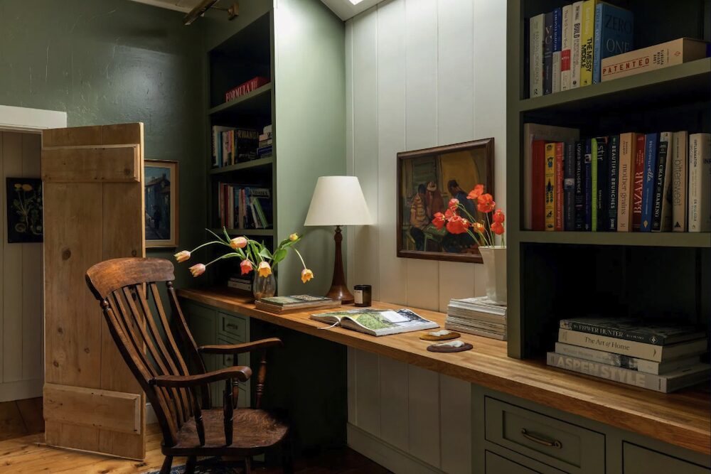Office space with a desk and shelves of books at 809 North Quaker Hill Road, Pawling NY.