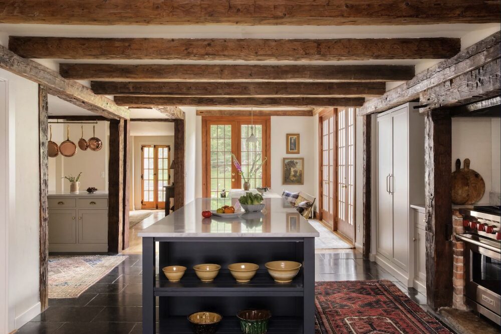 Open room view of kitchen and dining space to the windows of the kitchen sink at 809 North Quaker Hill Road, Pawling NY.