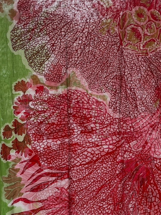 A bright colored hand-dyed scarf at Tender Land Home in Phoenicia NY.scarf