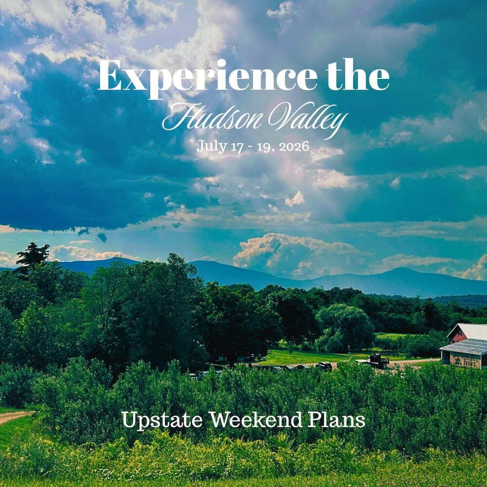 Landscape image of Rose Hil Farm from the top of the hill out past the trees, to the Catskill Mountains and great sky with the "Experience the Hudson Valley" and "Upstate Weekend Plans" text written across the photo.