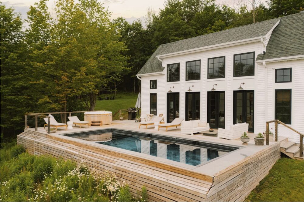 Back porch, pool and yard at 648 Scudder Hill Rd, Roxbury NY.