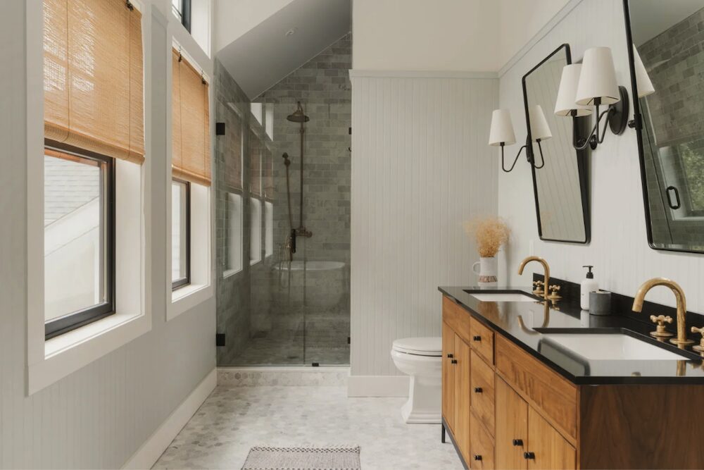 Bathroom sink and shower at 648 Scudder Hill Rd, Roxbury NY.