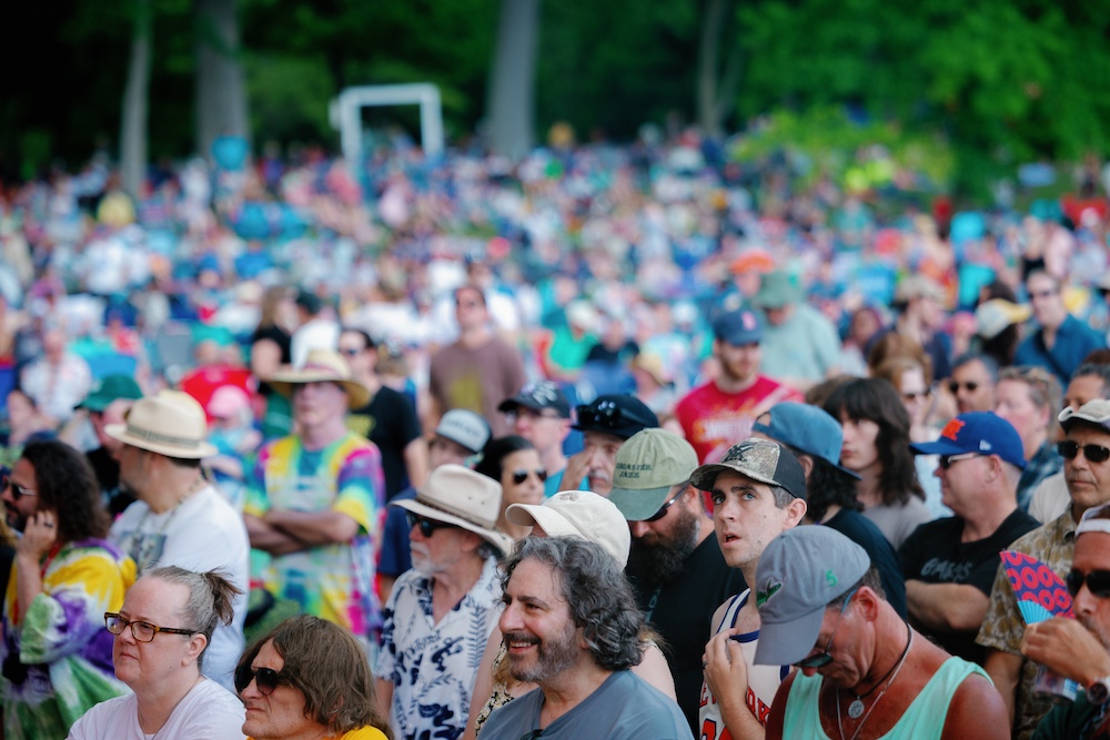Crowds of people enjoying the music at the Hudson River Music Festival in Croton Point Park NY.