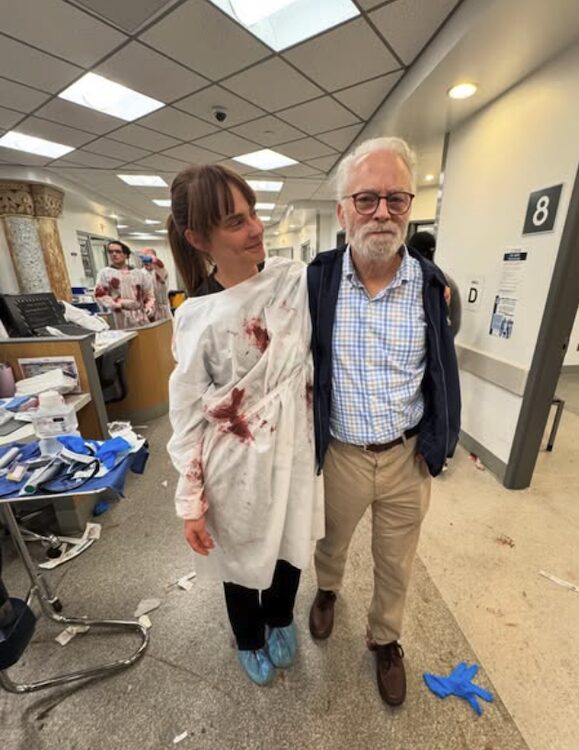 Fiona Dourif and her Dad on set for The Pitt in bloody scrubs.