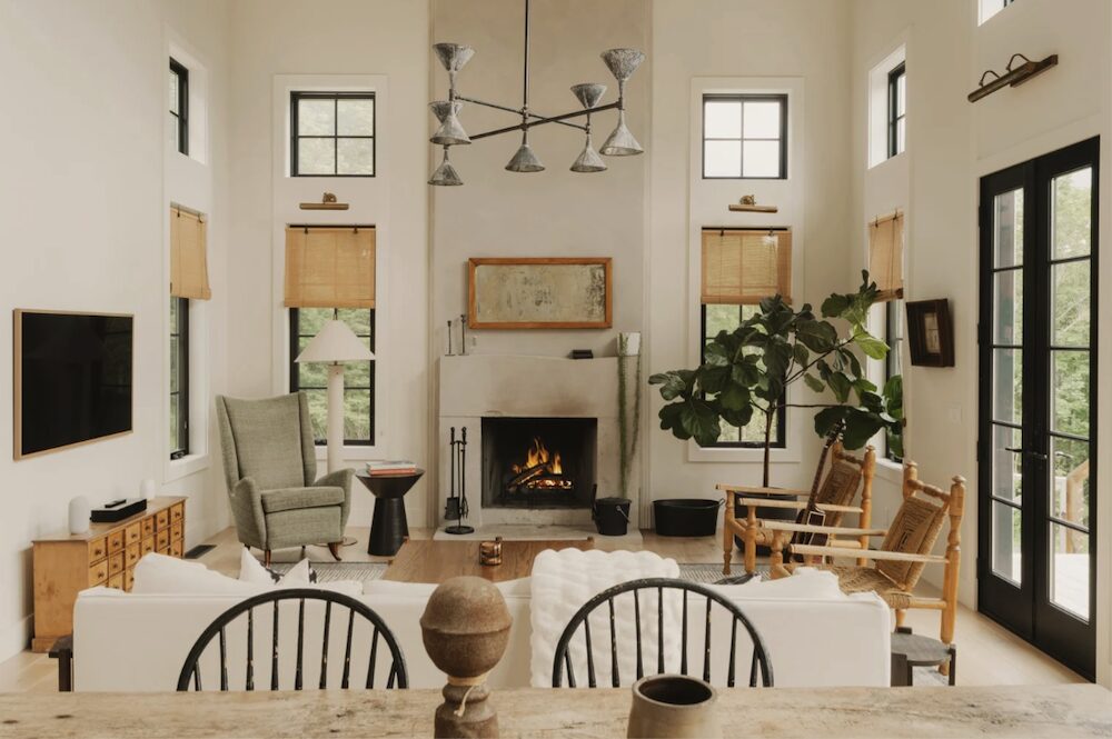 Living room fireplace and furniture at 648 Scudder Hill Rd, Roxbury NY.