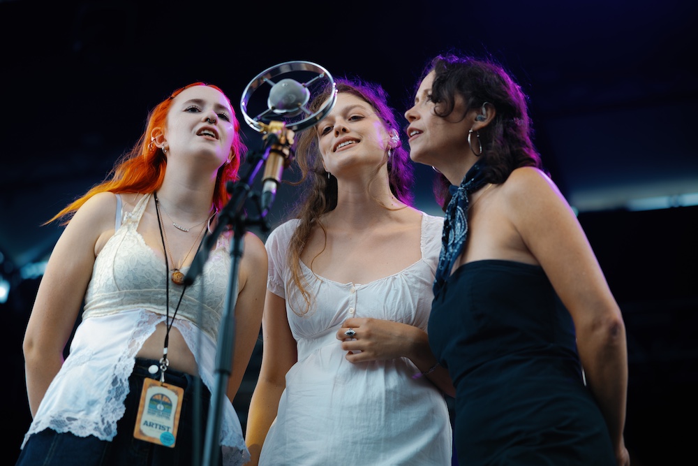 Guthrie Family Singers on stage singing at the Hudson River Music Festival in Croton Point Park NY.