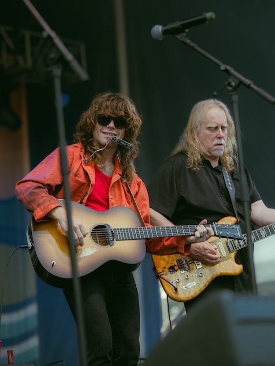 Jesse Welles and Warren Haynes on stage performing at the Hudson River Music Festival in Croton Point Park NY.