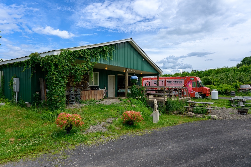 The Ranch building for tasting and the food truck at Stone Ridge Orchard.
