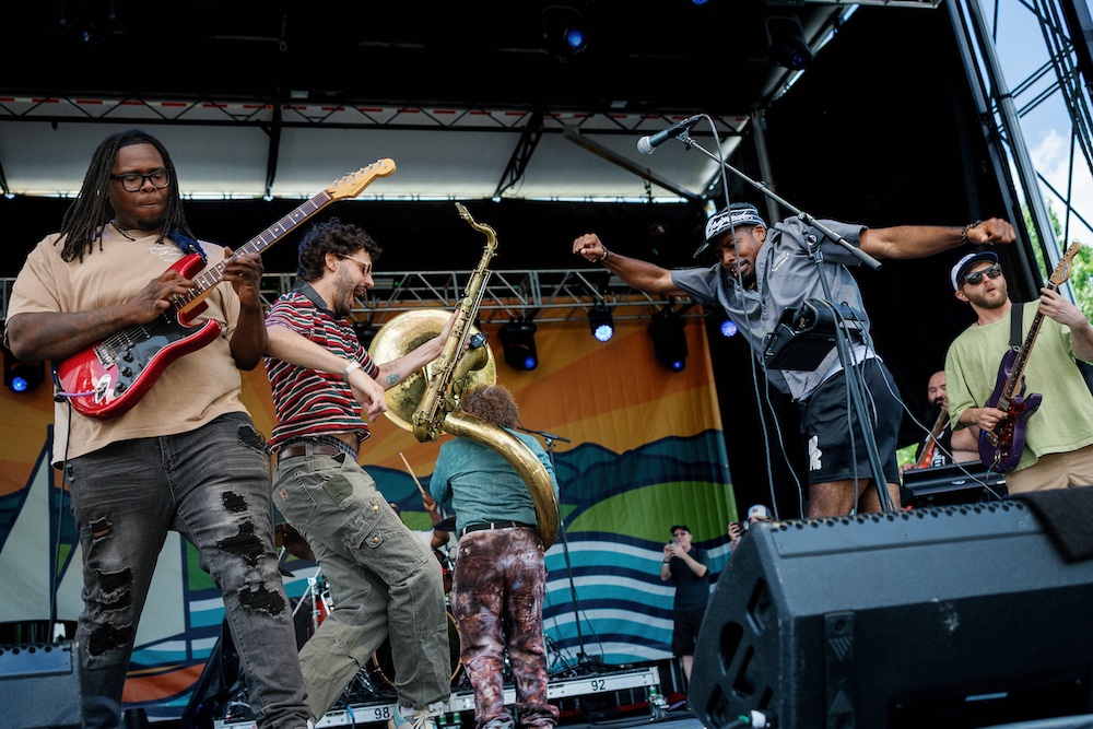 SNACKTIME band whipping it up on stage with vigor at the Hudson River Music Festival in Croton Point Park NY.