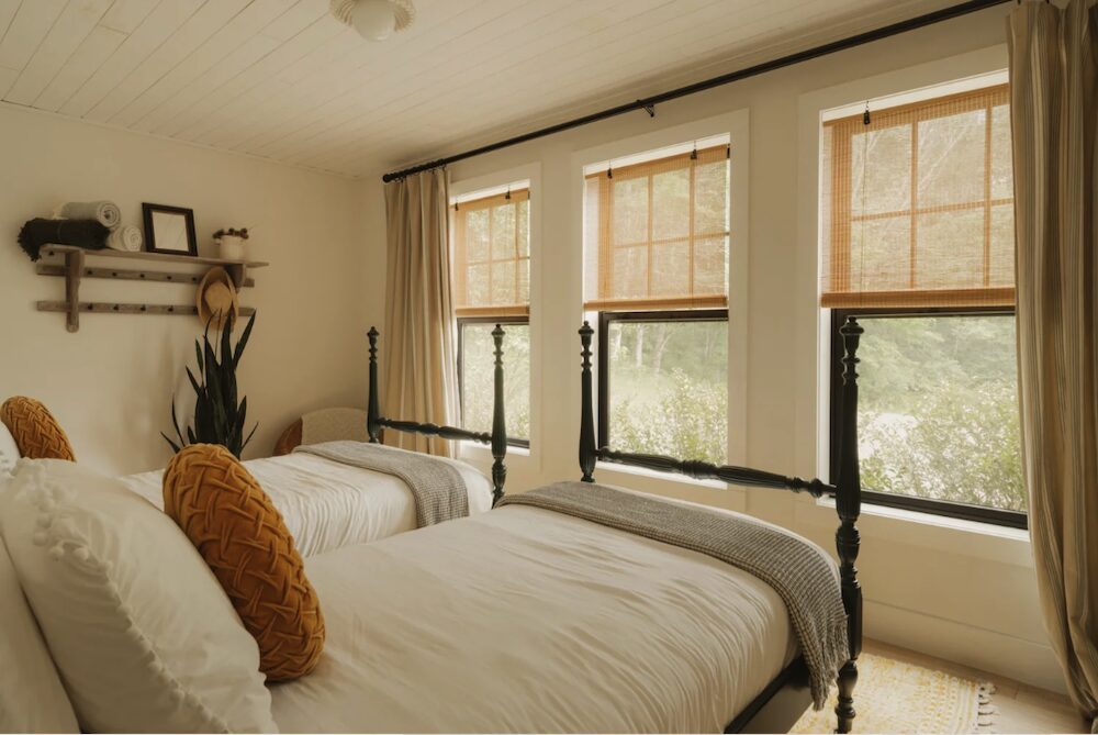 Twin beds and windows at 648 Scudder Hill Rd, Roxbury NY.