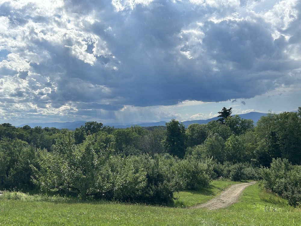 Rain and sunshine through the tumbling clouds across the mountains and the Hudson Valley NY.