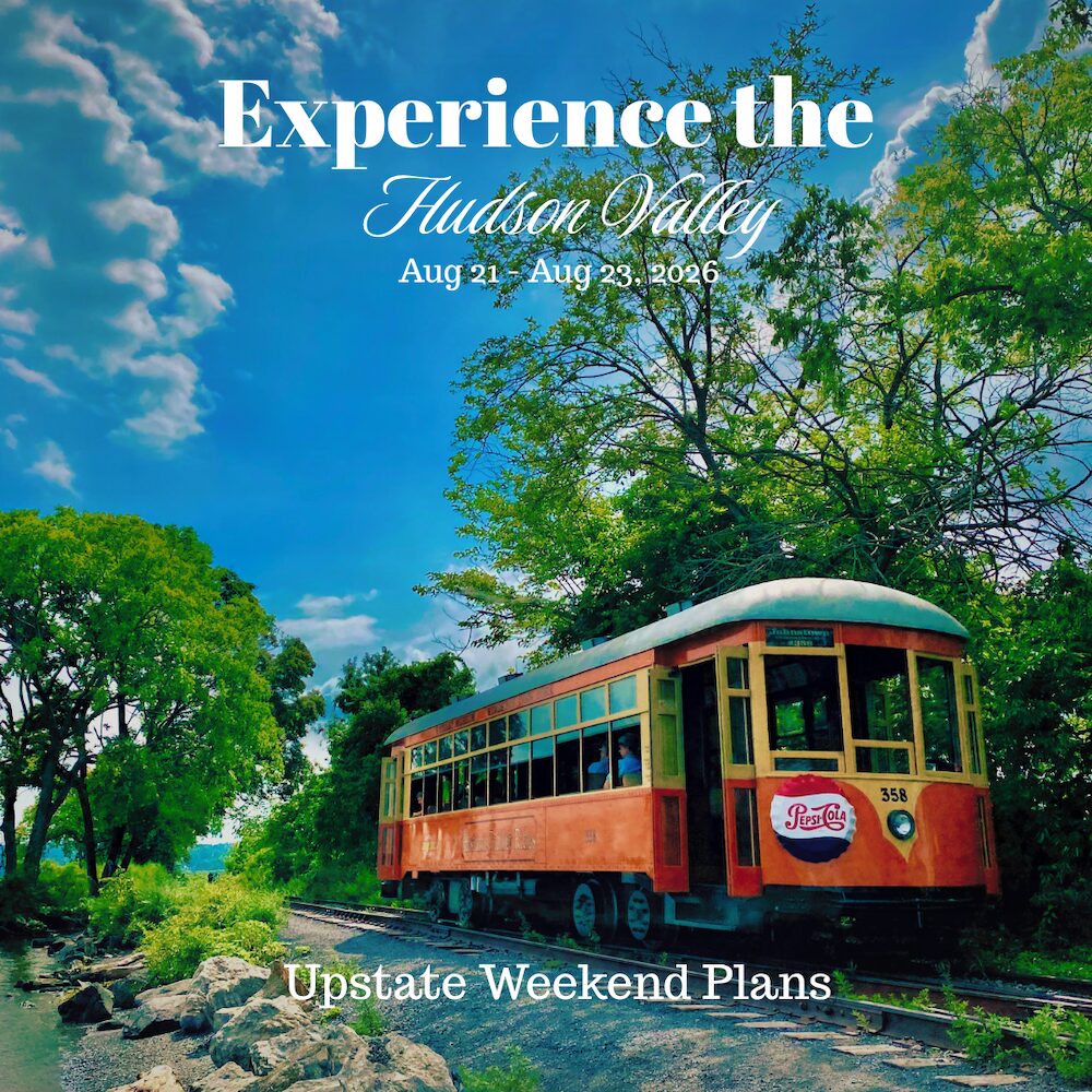 A trolley rolling along the rails at Kingston Point with the "Experience the Hudson Valley" and "Upstate Weekend Plans" text written across the photo.