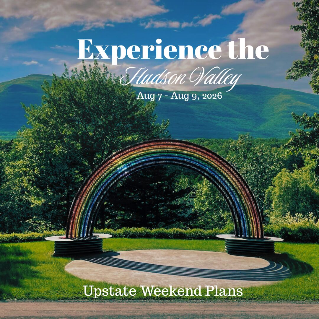 The rainbow sculpture at the Spiral House Park in Saugerties NY with the Catkills in the back ground with the "Experience the Hudson Valley" and "Upstate Weekend Plans" text written across the photo.