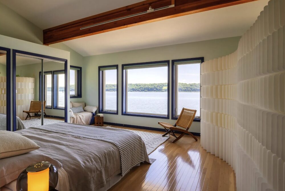 Bedroom and view of the Hudson River at 63 River Road, Malden NY.