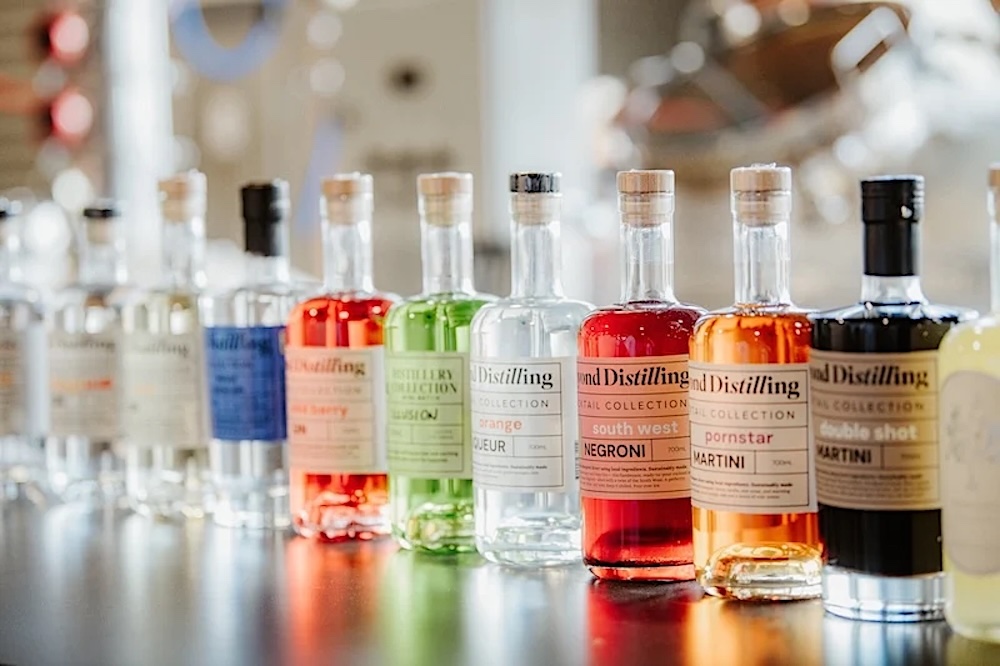 Multiple colorful bottles of distilled spirits from Beyond Distilling in North Charleston SC.