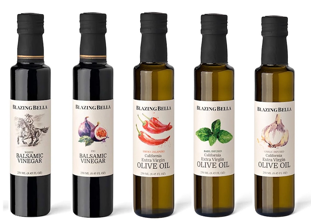 Multiple bottles of infused oils for cooking from Blazing Bella Balsamic Vinegar and Olive Oils in West Chester, PA.