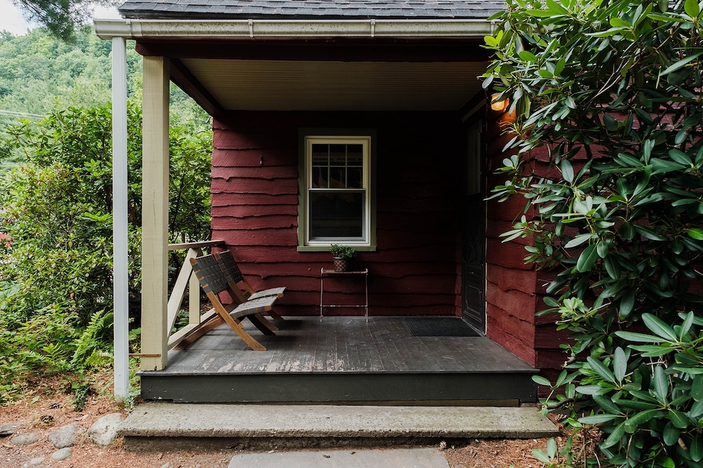 A corner nook next entrance and deck of a cabin at Phoenicia Lodge in the Catskills.