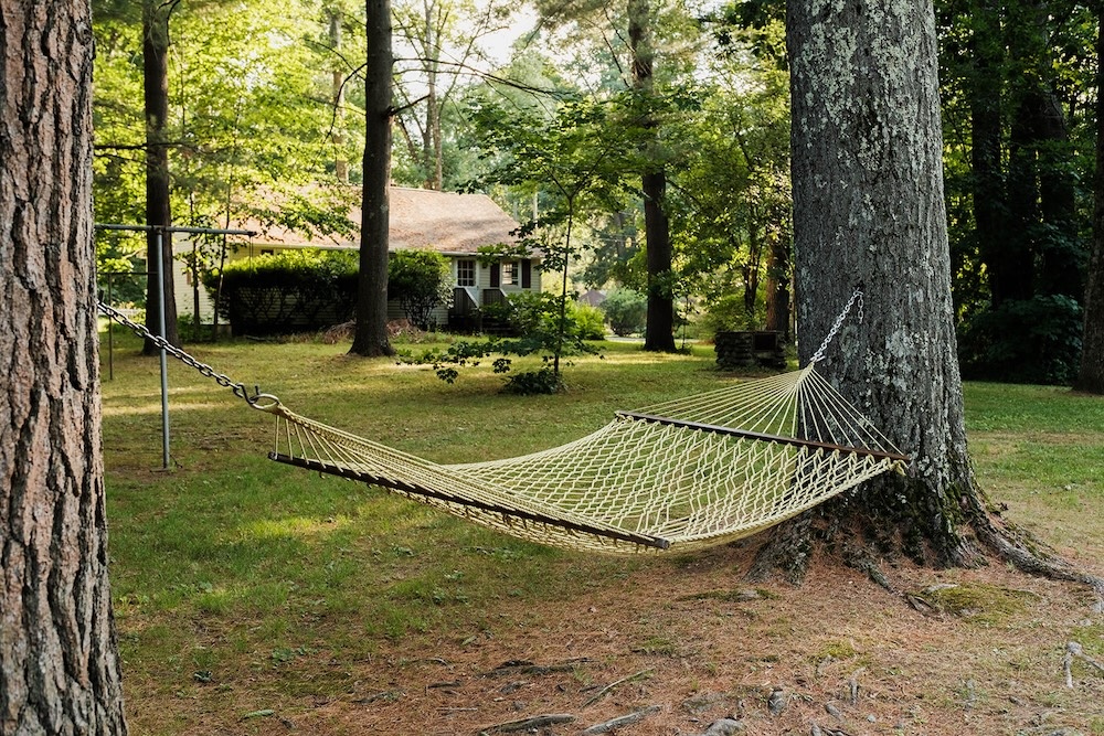 A hammock between two trees at Phoenicia Lodge in the Catskills.