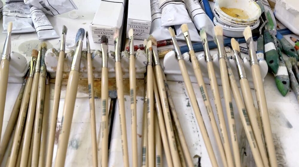 Paint brushes in the studio of artist Jenny Nelson