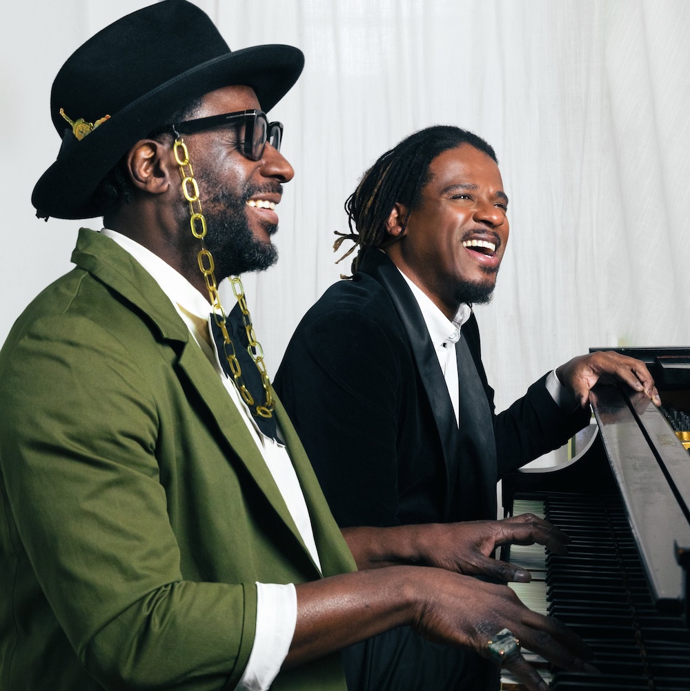 Ryan Shaw and Ray Angry playing piano.