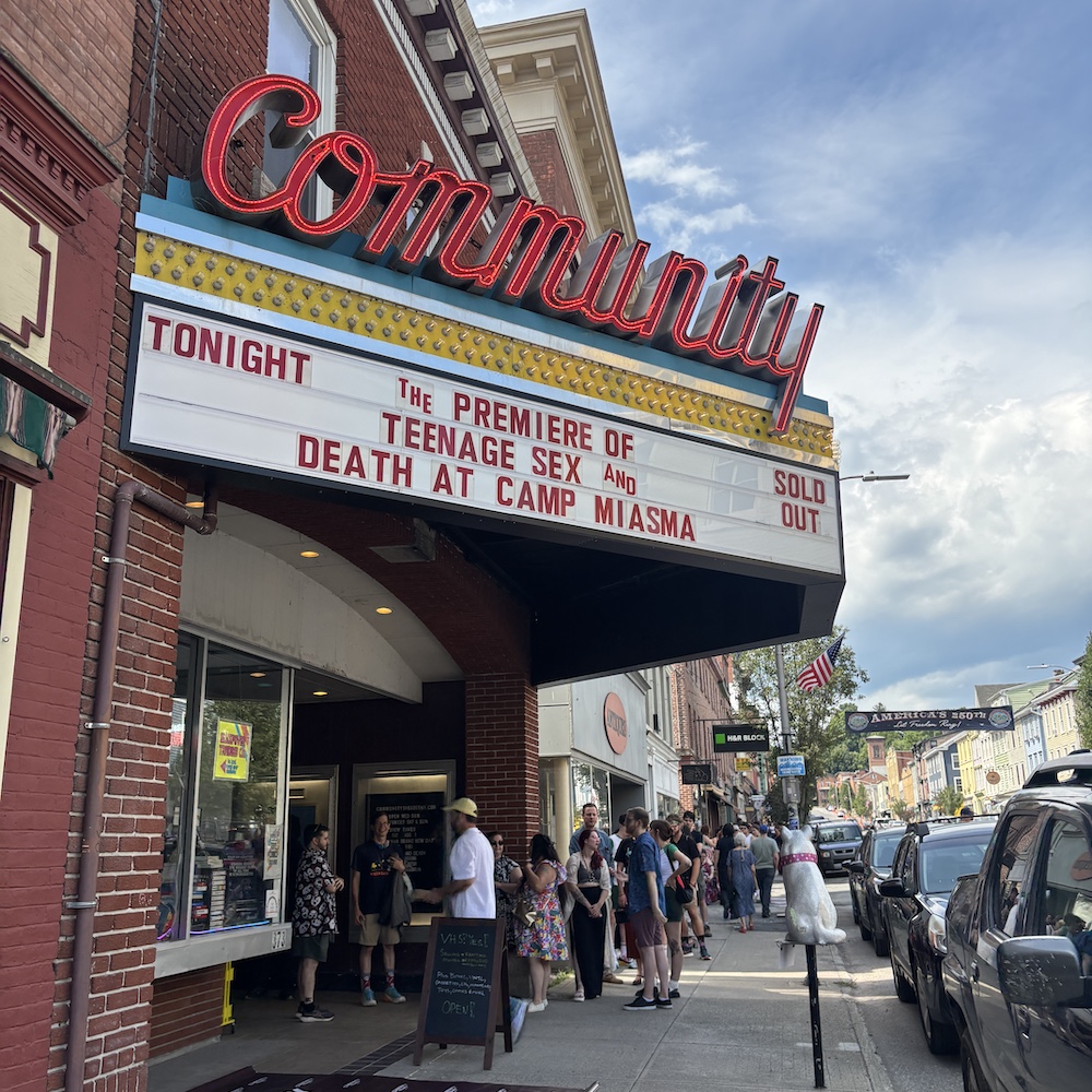 The street and sign on the marquee at Community Theater in Catskill NY.