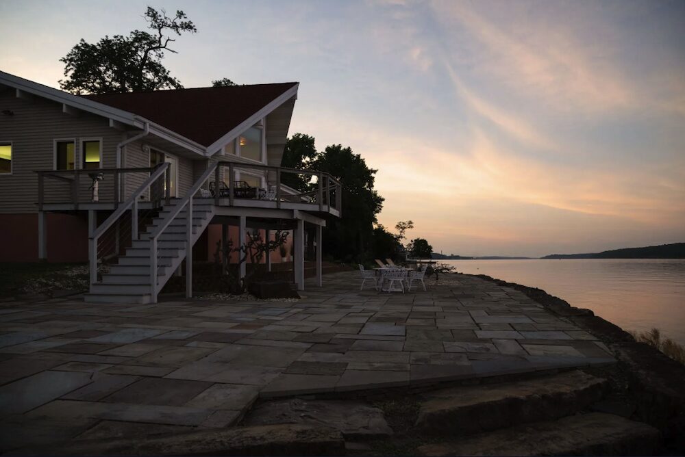 Exterior of house on the Hudson River at sunset at 63 River Road, Malden NY.